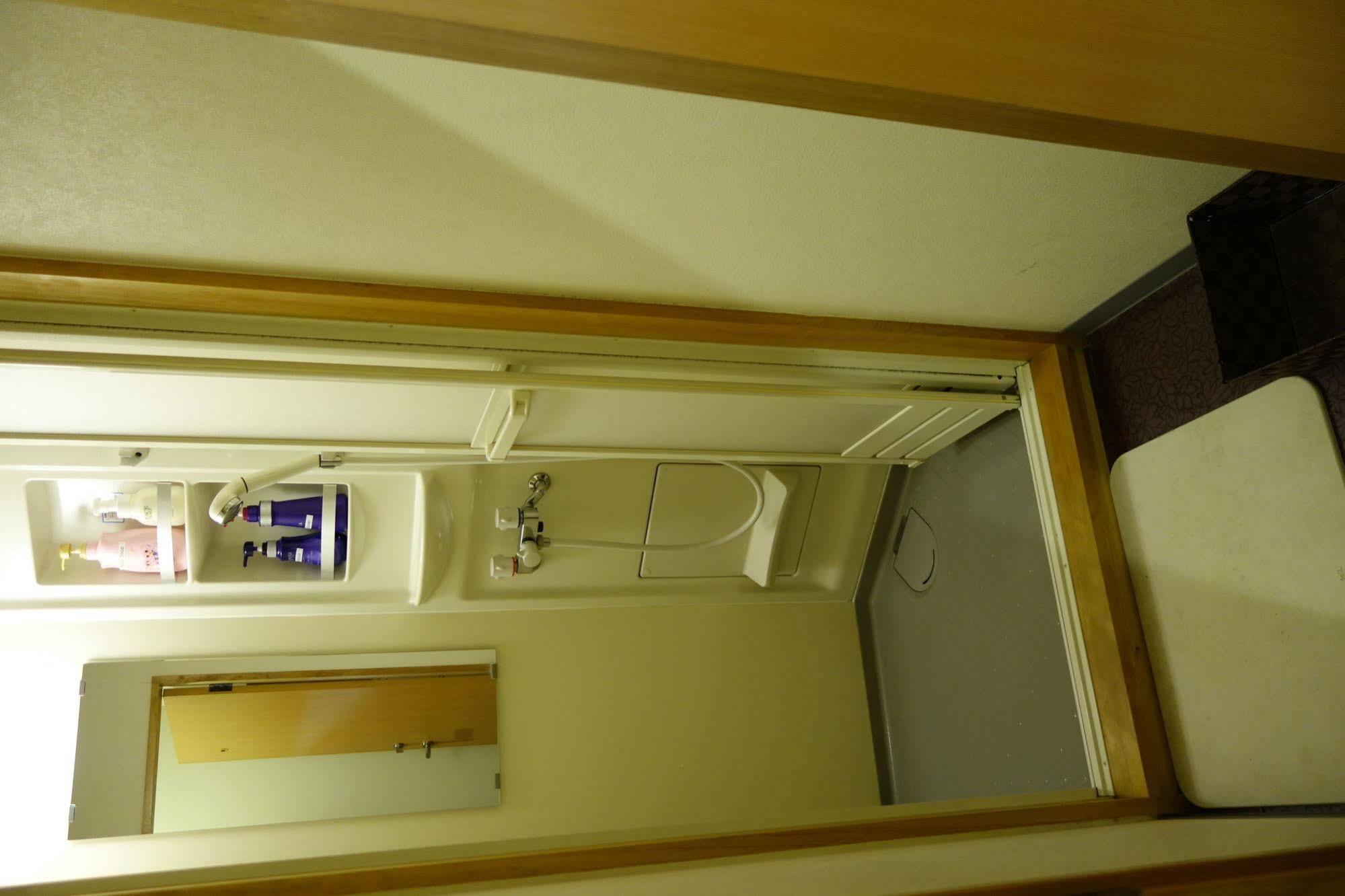 Guesthouse Akicafe Inn Hiroshima Extérieur photo