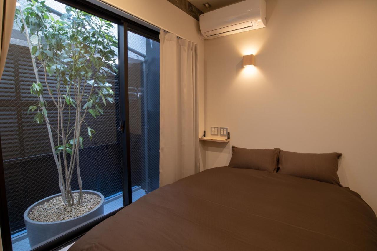 Guesthouse Akicafe Inn Hiroshima Extérieur photo