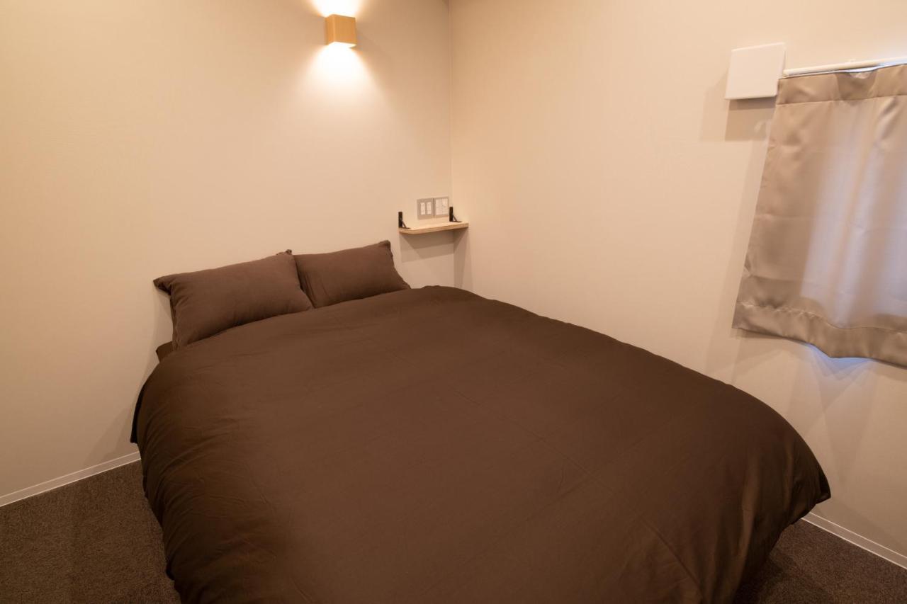 Guesthouse Akicafe Inn Hiroshima Extérieur photo